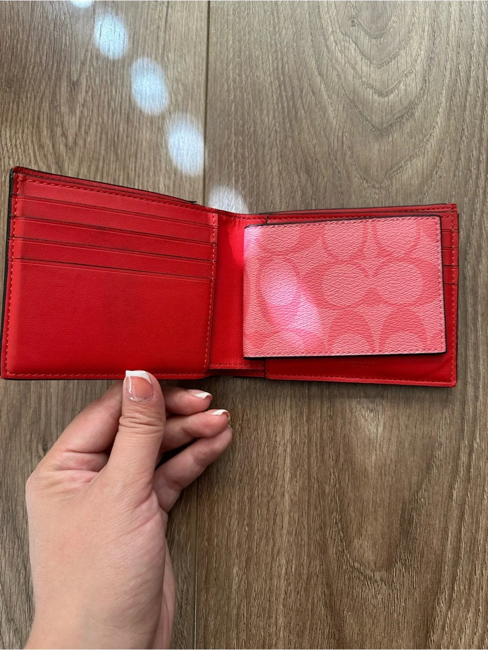 Coach Orange Signature Pattern Bifold Wallet